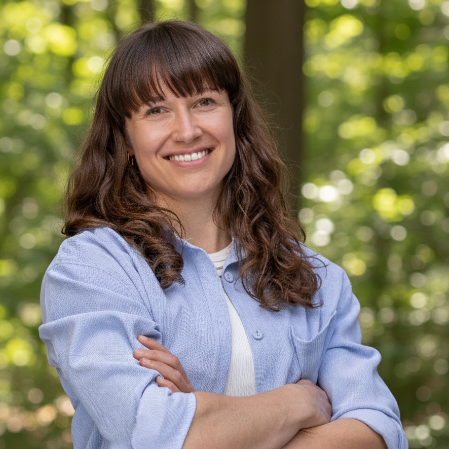 photo of smiling woman with long dark brown hair
